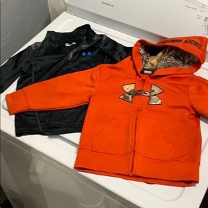 light UA half zip and orange/camo sweatshirt